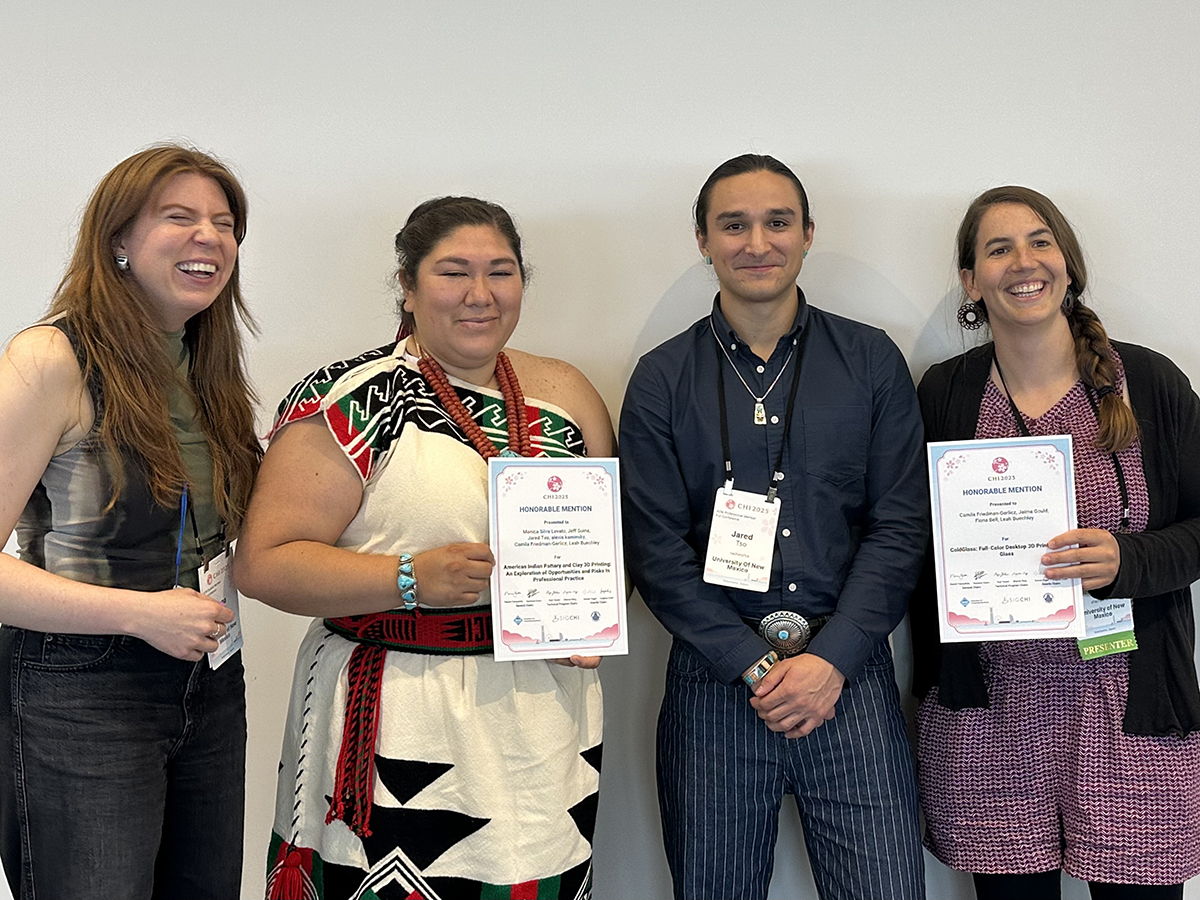 photo: members of the Hand and Machine lab with their awards.